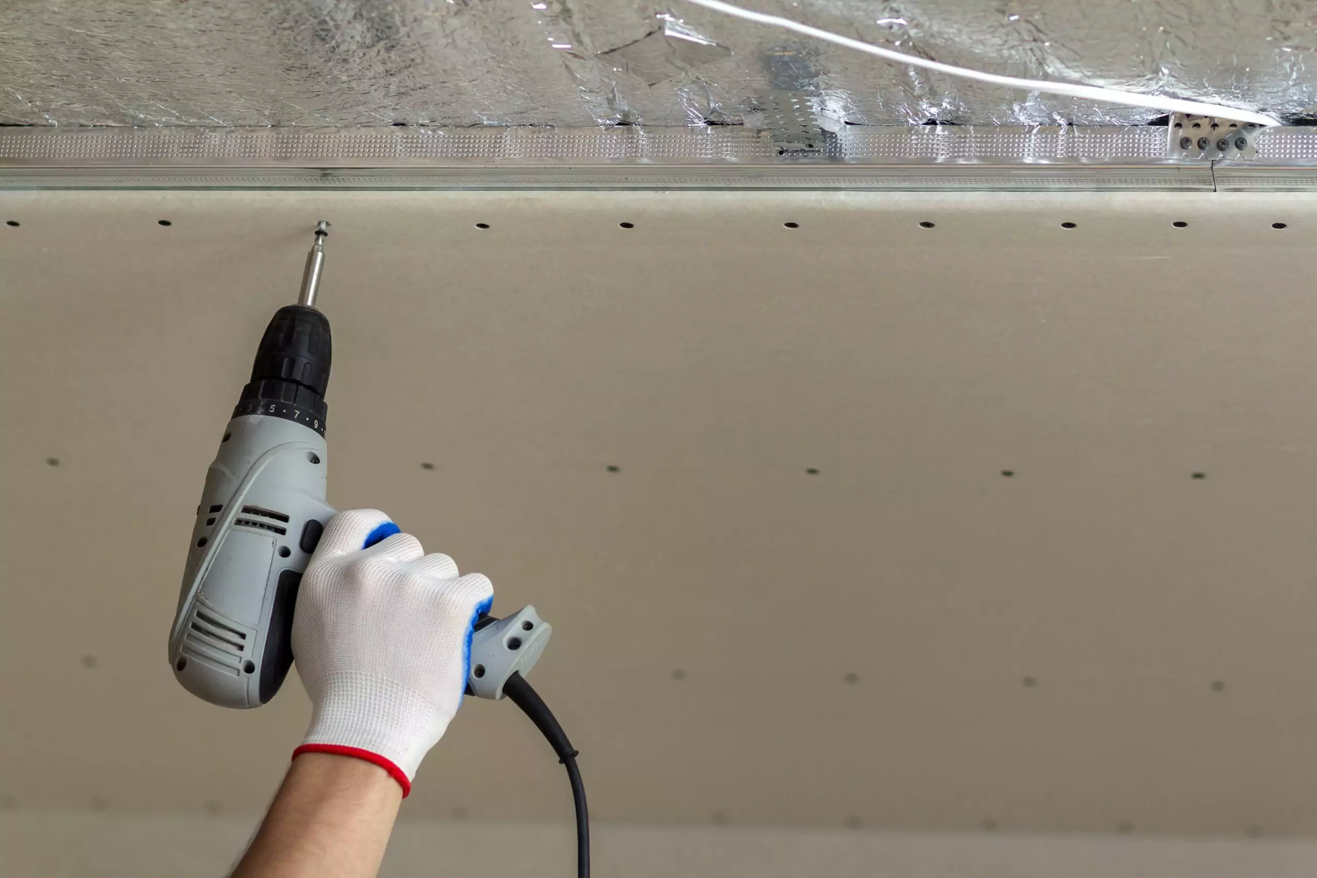 worker-hand-with-screwdriver-connecting-suspended-01-17-17-08-00-prime-one-builders